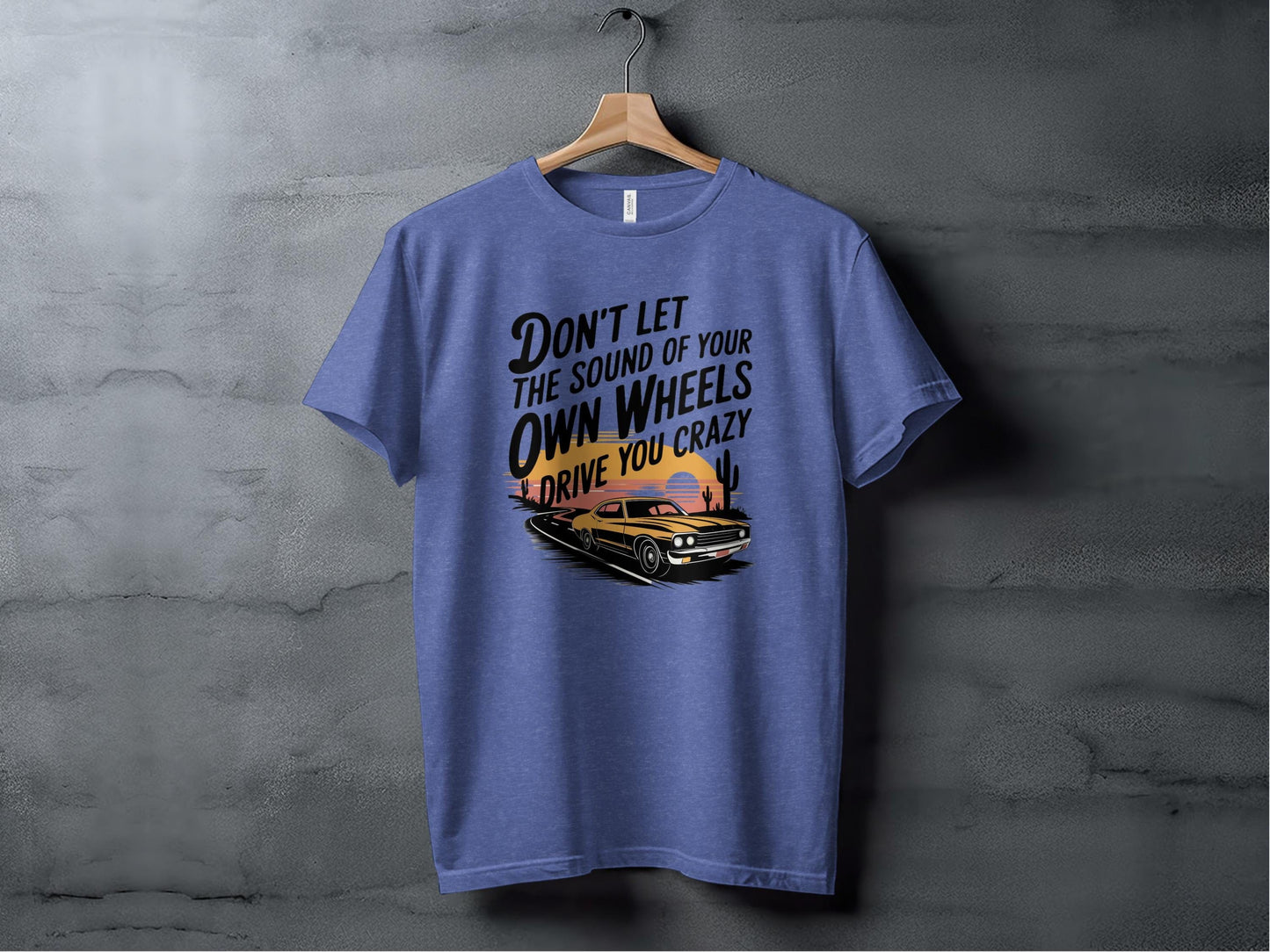 Don't Let the Sound of Your Own Wheels Tee XS / Heather True Royal